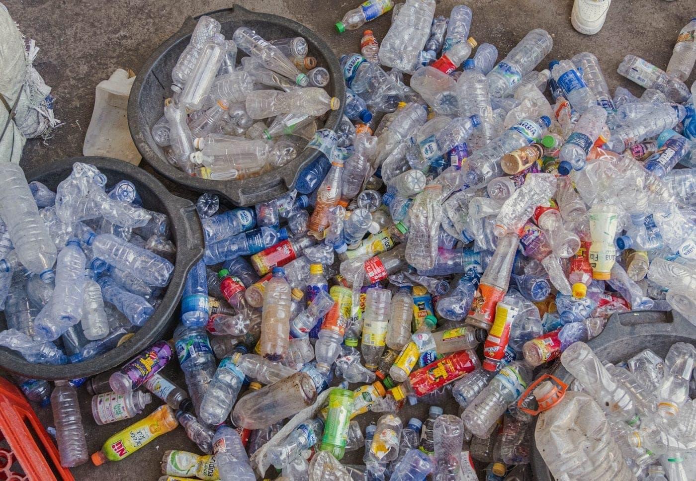 Collected plastic bottles and cans piled together in Indonesia