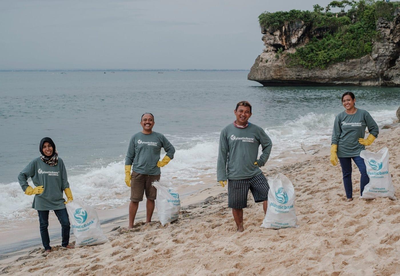 Plastic Bank team clearing plastic from a beach in Bali